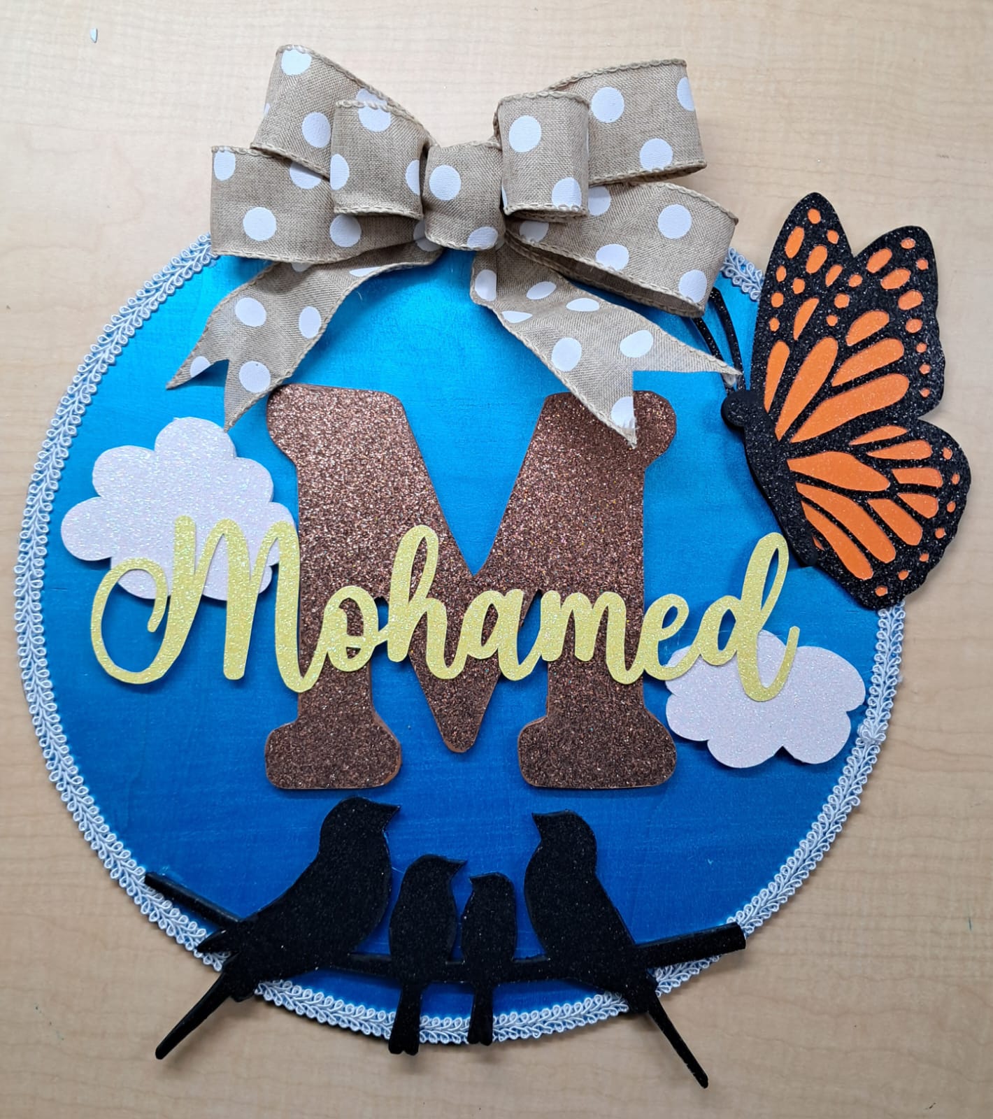 Wooden door hanger with family design